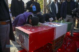 مراسم تدفین پیکر دو شهید گمنام دفاع مقدس در بوستان شهید زین الدین قم