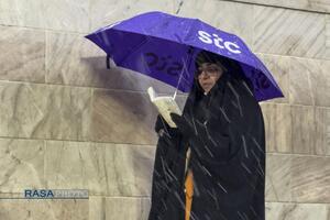 بارش باران و برف در حرم مطهر رضوی