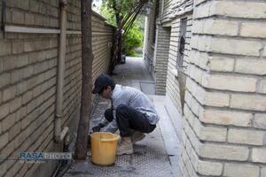 فعالیت جهادی طلاب در منازل آسیب‌دیده تهران در سومین جنگ تحمیلی